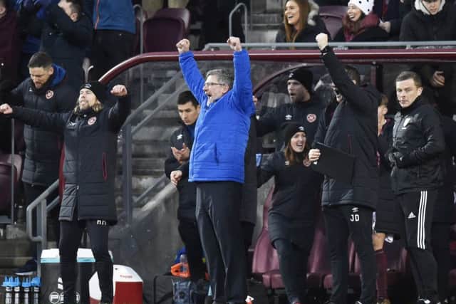 Craig Levein celebrates the full-time whistle as Hearts defeat Hibs in January. Picture: SNS