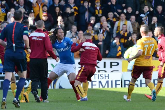 Mohsni (centre) clashes with Motherwell players after the play-off loss. Picture: SNS Group