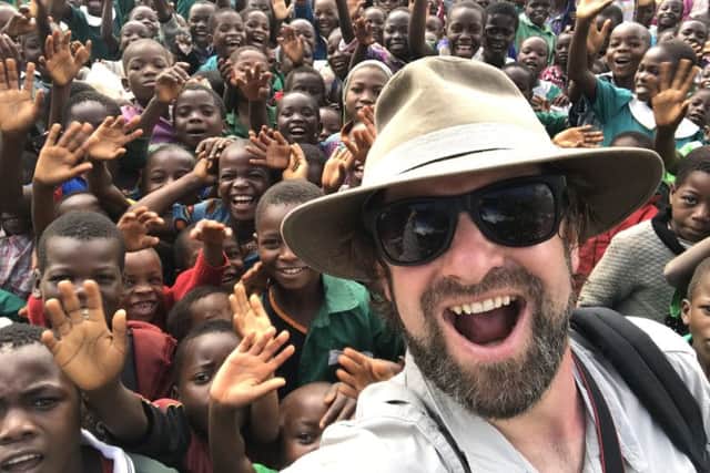 Edinburgh-based filmmaker Mally Graveson takes a selfie with pupils in Malawi. Picture: Contributed