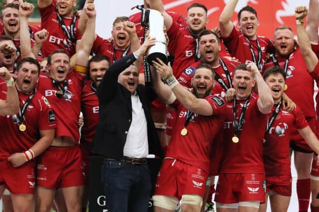 Scarlets' John Barclay lifts the trophy with team-mates after the Guinness Pro12 final at the Aviva Stadium, Dublin. Picture: Brian Lawless/PA