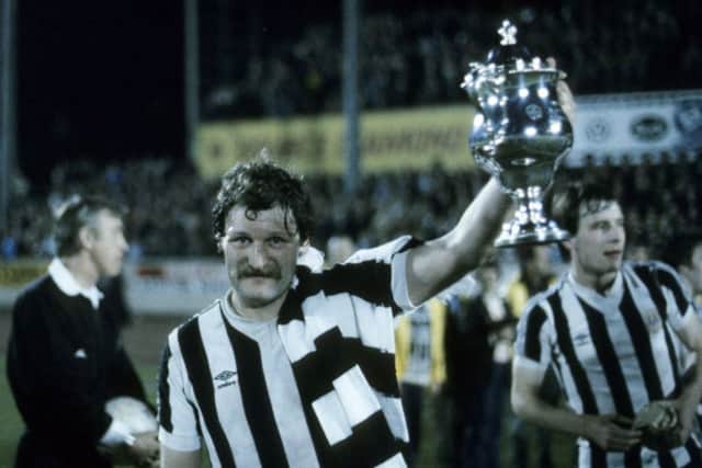 Jimmy Bone, St Mirren captain, holds the Anglo-Scottish Cup aloft after the Buddies defeated Bristol City 5-1 on aggregate in April 1980. Picture: SNS Group