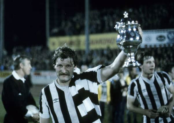 Jimmy Bone, St Mirren captain, holds the Anglo-Scottish Cup aloft after the Buddies defeated Bristol City 5-1 on aggregate in April 1980. Picture: SNS Group