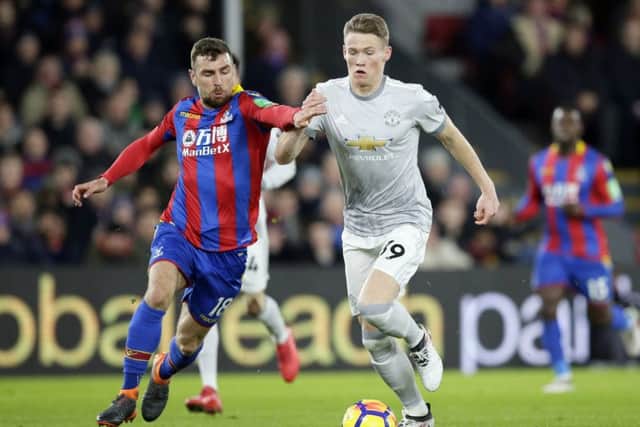 Scott McTominay competes for the ball with Crystal Palace's James McArthur. Picture: AP