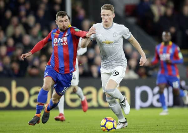 Scott McTominay competes for the ball with Crystal Palace's James McArthur. Picture: AP