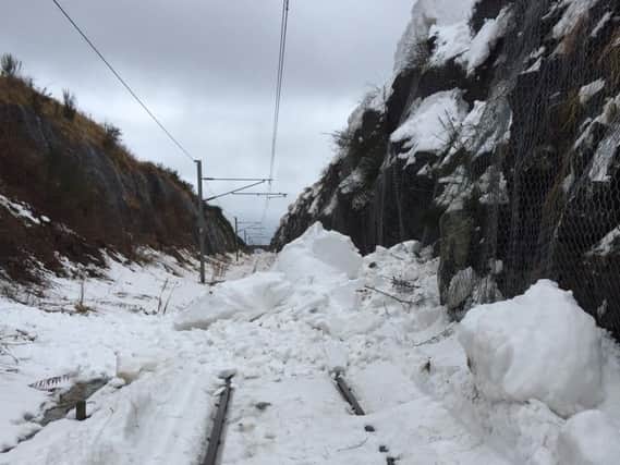 A 'superwoman' surgeon who made an eight-mile trek through snow to treat a patient has described her efforts as 'no big deal'