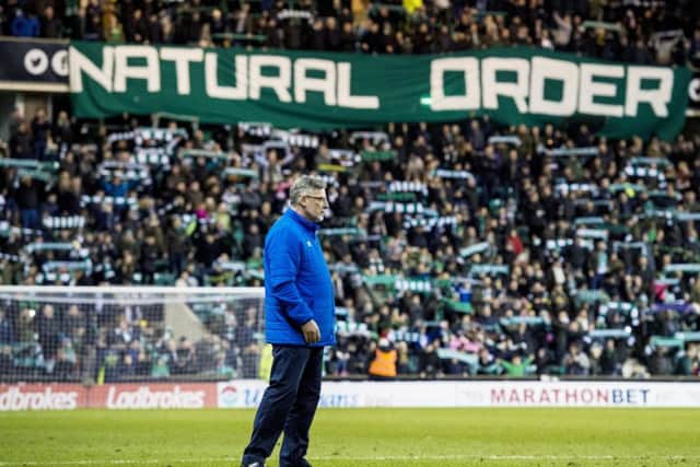 Hearts manager Craig Levein, with the Hibs fans' 'Natural Order' banner behind him. Picture: Alan Harvey/SNS