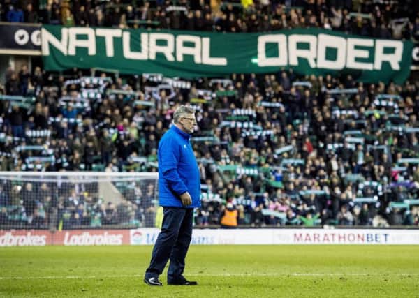 Hearts manager Craig Levein, with the Hibs fans' 'Natural Order' banner behind him. Picture: Alan Harvey/SNS
