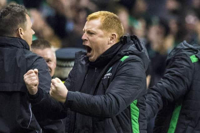 Neil Lennon celebrates Hibs' 2-0 victory at Easter Road last night