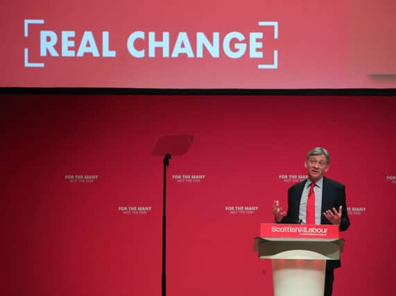 Richard Leonard addresses his party at Caird Hall, Dundee, yesterday. He promised to bring private finance initiatives in house and spend the savings on better mental health services. Photograph: Jane Barlow/PA