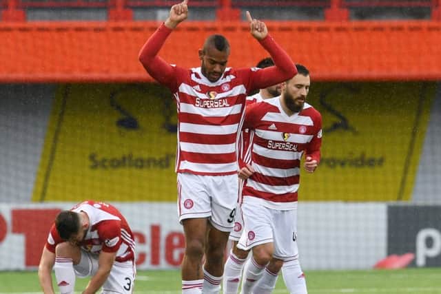Hamilton's Marios Ogboe celebrates after opening the scoring. Picture: SNS