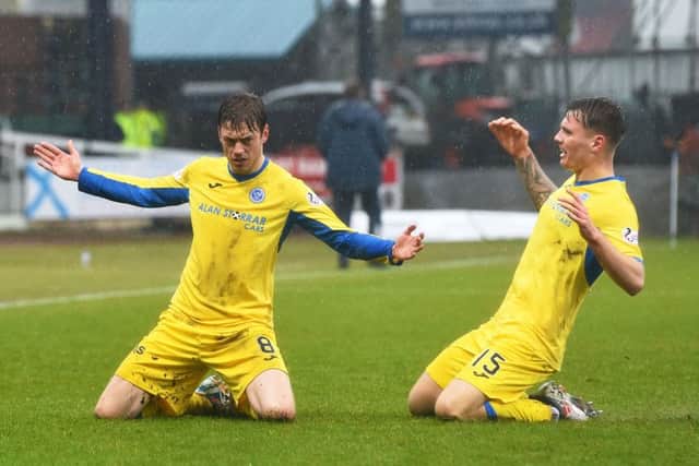 Murray Davidson, left, celebrates the opener with Jason Kerr. Picture: SNS
