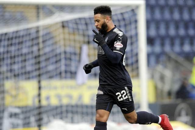 Alex Jakubiak celebrates netting Falkirk's third. Picture: Michael Gillen