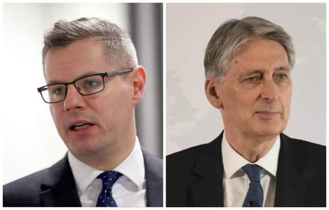 Derek Mackay, left, has called on Philip Hammond to provide more clarity on Brexit. Pictures: PA/Getty Images