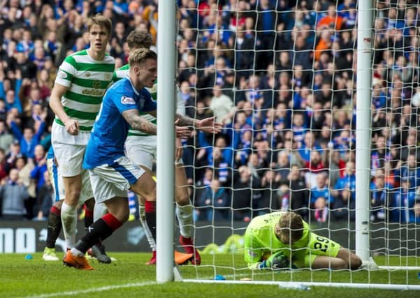 Scott Bain dives on the ball and Jason Cummings looks on in disbelief after Alfredo Morelos (behind Kristoffer Ajer) strikes the post. Picture: SNS.