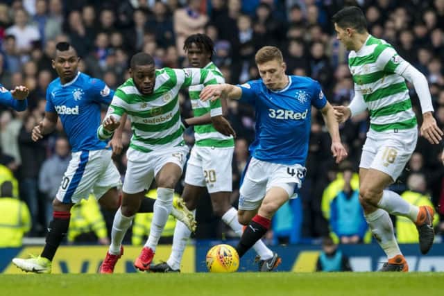 Celtic's Olivier Ntcham gets away from Rangers' Greg Docherty. Picture: SNS/Alan Harvey