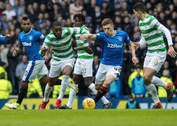 Celtic's Olivier Ntcham gets away from Rangers' Greg Docherty. Picture: SNS/Alan Harvey