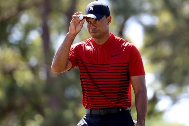 Tiger Woods tips his cap after a putt on the sixth hole during the final round of the Valspar Championship. Picture: Sam Greenwood/Getty Images