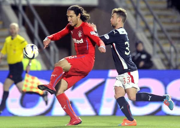 Bilel Mohsni pictured in action for Rangers against Falkirk's Rory Loy in February 2015. Picture: Michael Gillen
