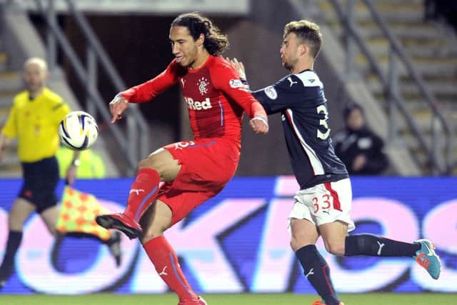 Bilel Mohsni pictured in action for Rangers against Falkirk's Rory Loy in February 2015. Picture: Michael Gillen