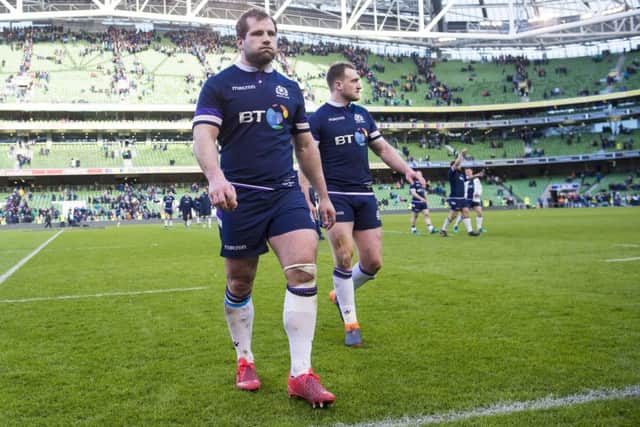 Fraser Brown, left, leaves the field in Dublin with Stuart Hogg on Saturday.