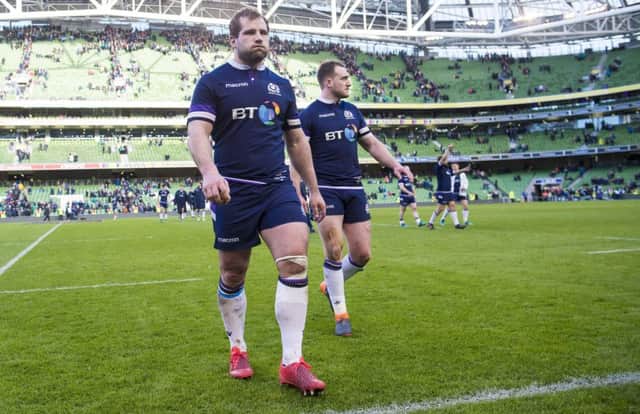 Fraser Brown, left, leaves the field in Dublin with Stuart Hogg on Saturday.