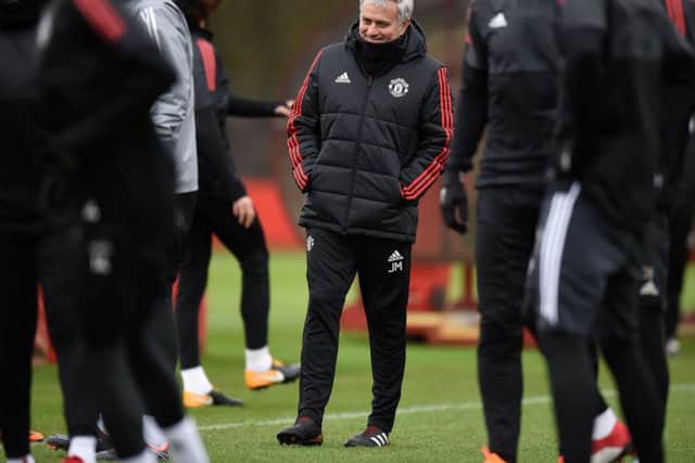 Jose Mourinho supervises Manchester Uniteds training session ahead of their Champions League clash with Sevilla. Picture: Getty.