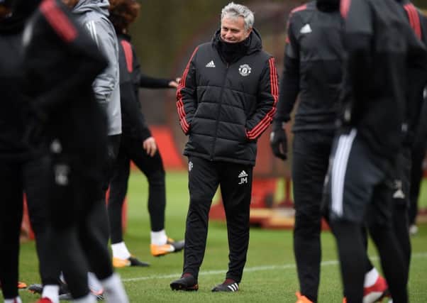 Jose Mourinho supervises Manchester Uniteds training session ahead of their Champions League clash with Sevilla. Picture: Getty.