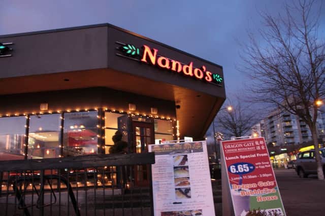 Nando's has accused chicken shop Fernando's in Reading of copying its name and logo