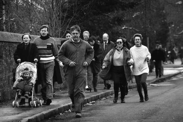 Parents rush to the school after news of the shooting broke in Dunbland. PIC: TSPL