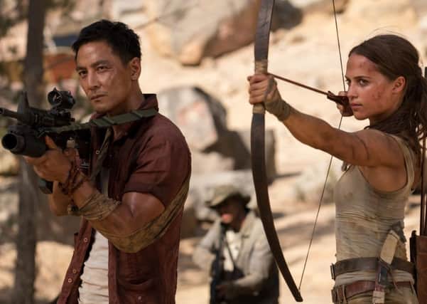 Daniel Wu as Lu Ren and Alicia Vikander as Lara Croft. PIC: PA Photo/Warner Bros. Entertainment Inc./Metro-Goldwyn-Mayer Pictures Inc./Ilze Kitshoff
