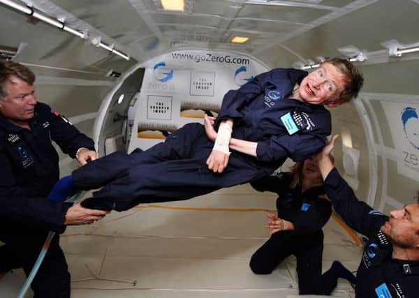 Stephen Hawking experiences zero gravity during a flight over the Atlantic Ocean in 2007. "It was amazing ... I could have gone on and on," he said.