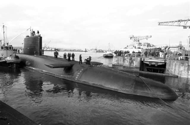 The nuclear submarine HMS Revenge is arrives at Rosyth naval dockyard in April 1980.
