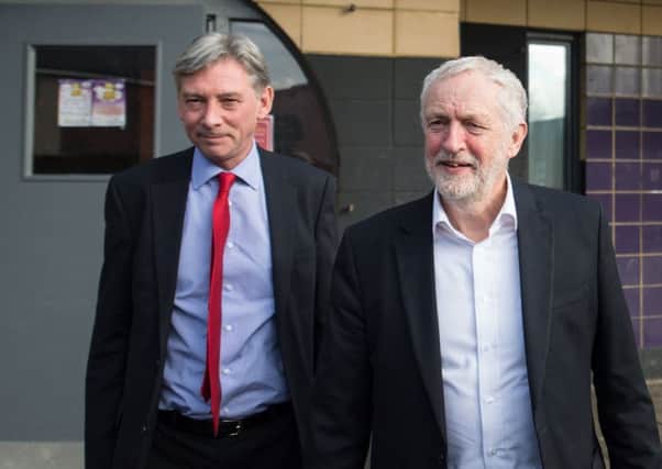 Labour leader Jeremy Corbyn (left) and Scottish Labour leader Richard Leonard after his address to delegates at the Scottish Labour Party Conference in the Caird Hall, Dundee.