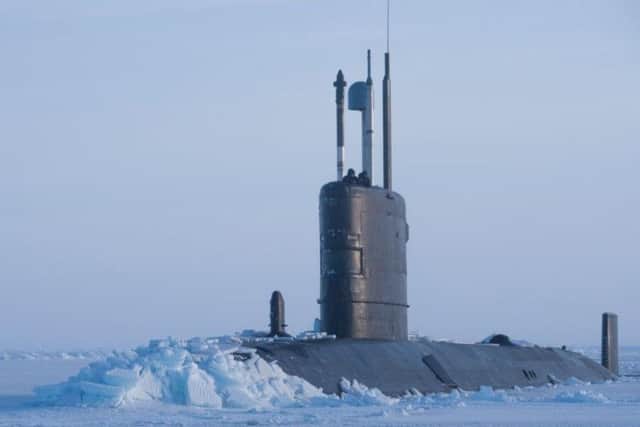 HMS Trenchant up through ice on ICEX18. Picture: Ministry of Defence