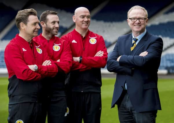 Peter Grant, James McFadden and Stevie Woods join Alex McLeish at Hampden. They've been preparing for Friday's friendly with Costa Rica. Picture: Craig Williamson/SNS