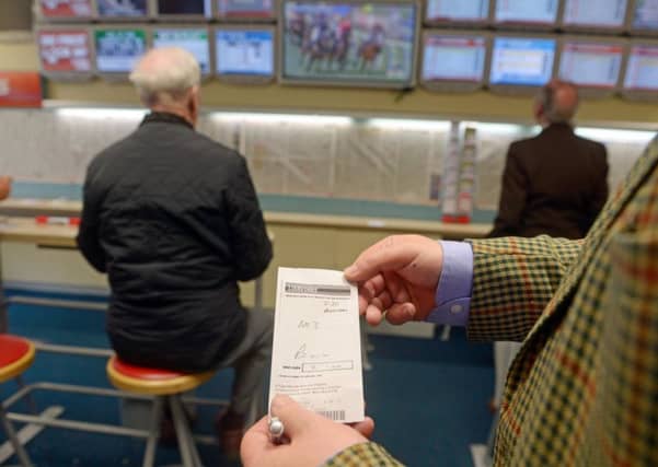 Betting shops could be driven out of business if the UK Government cuts the maximum stake on gaming machines to £2, says industry spokesman Donald Morrison