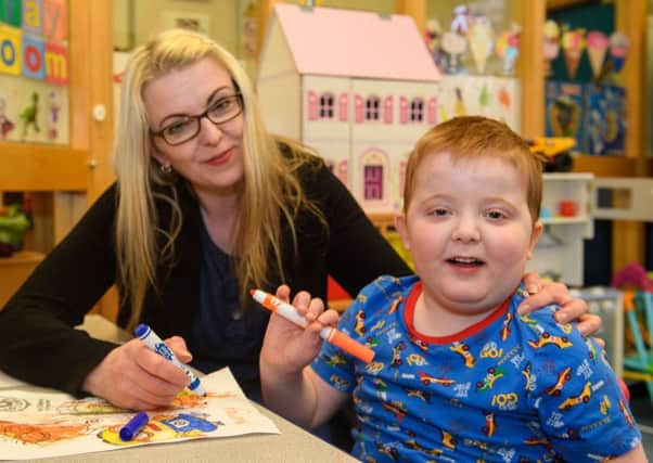 Karen Gray, with her son Murray, five, is campaigning for cannabis-based medicines to be made available in Scotland. Picture: Ian Georgeson