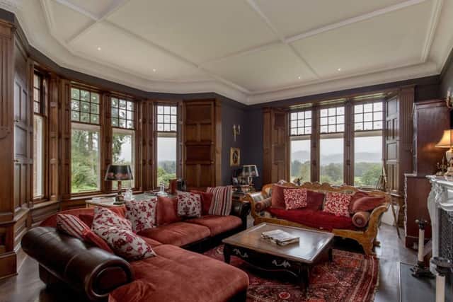 The panelled drawing room and dining room in the older part of Cowden House. Pic: Savills