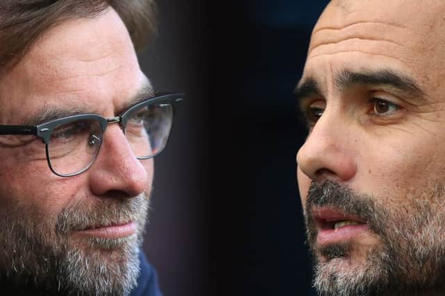Liverpool manager Jurgen Klopp, left, and Manchester City counterpart Pep Guardiola will face off in next month's quarter-finals. Picture: Getty