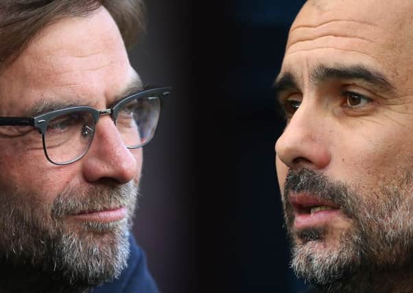 Liverpool manager Jurgen Klopp, left, and Manchester City counterpart Pep Guardiola will face off in next month's quarter-finals. Picture: Getty