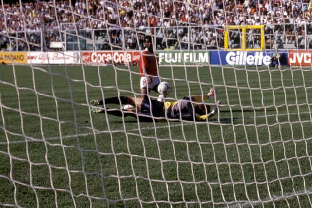Juan Cayasso chips the ball over Jim Leighton to give Costa Rica a 1-0 victory over the Scots in Genoa. Photograph: SNS