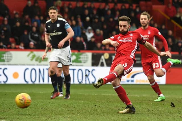 Aberdeen captain Graeme Shinnie scores the winner. Picture: SNS/Craig Foy