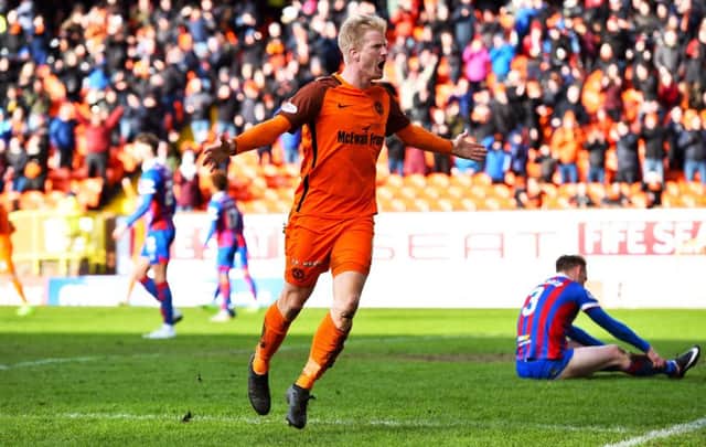 Dundee Utd's Thomas Mikkelsen celebrates after making it 1-1. Picture: SNS/Ross Parker