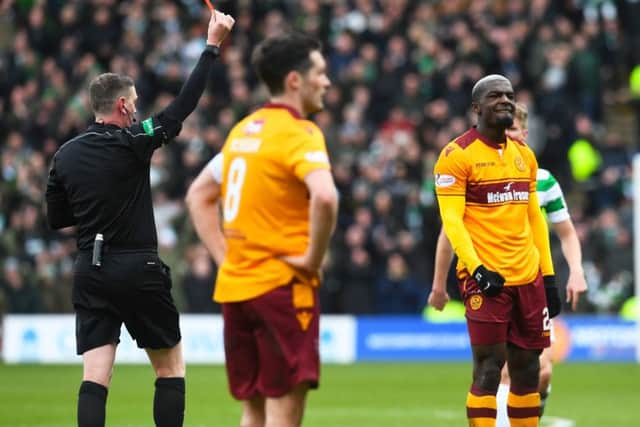 Cedric Kipre is shown a straight red card after an altercation with Scott Brown. Picture: SNS