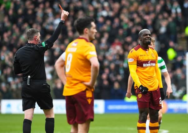 Cedric Kipre is shown a straight red card after an altercation with Scott Brown. Picture: SNS