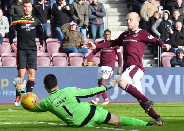 Steven Naismith beats Partick Thistle goalkeeper Tomas Cerny to score Hearts' second goal. Picture: SNS.