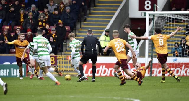 Motherwell were able to hold on to a draw despite playing the entire second half with ten men. Picture: SNS
