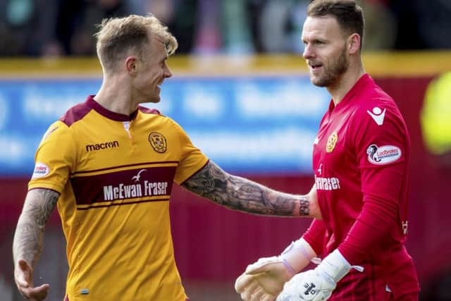 Richard Tait and Trevor Carson both played their part in a commendable draw for the home side. Picture: SNS