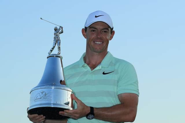 Rory McIlroy holds the Arnold Palmer Invitational trophy after his win at Bay Hill. Picture: Getty Images