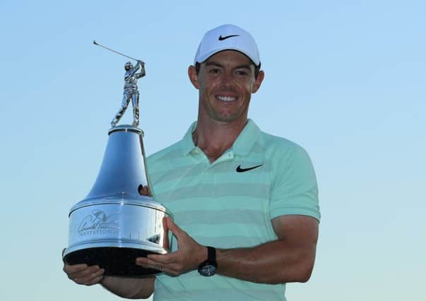 Rory McIlroy holds the Arnold Palmer Invitational trophy after his win at Bay Hill. Picture: Getty Images